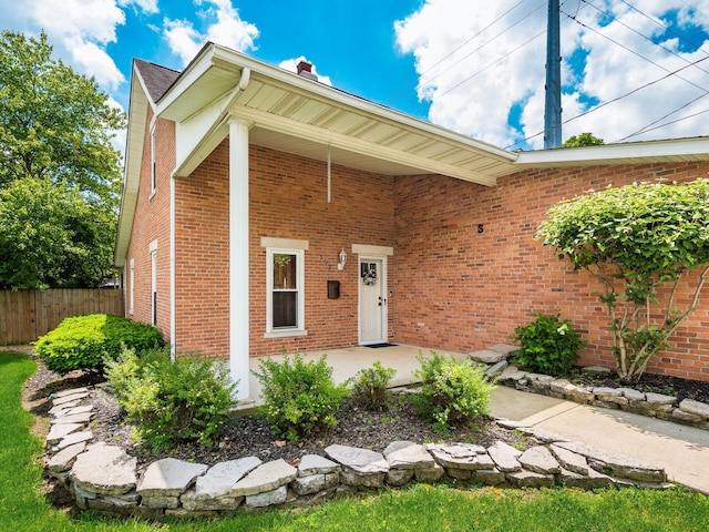 193 W Pearl St, West Jefferson, OH 43162 - view of front facade featuring brick siding