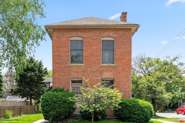 41 Hanford St, Columbus, OH 43206 - view of side of home with a chimney and brick siding