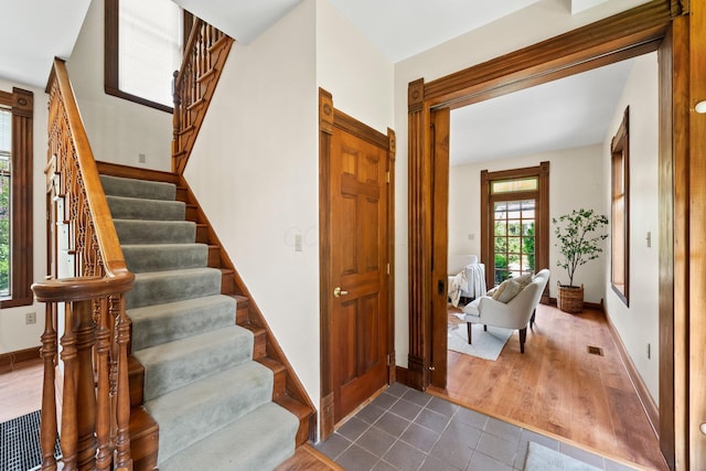 41 Hanford St, Columbus, OH 43206 - entrance foyer featuring stairs, dark wood-style floors, and baseboards