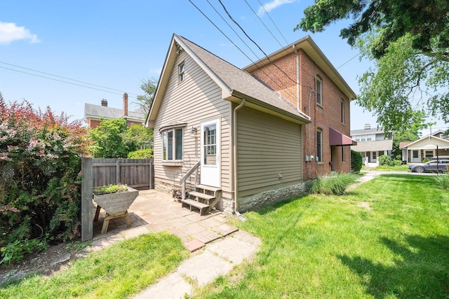 41 Hanford St, Columbus, OH 43206 - view of property exterior with entry steps and a patio area