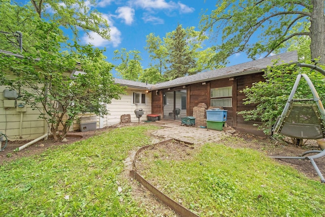 2692 Jordan Rd, Columbus, OH 43231 - rear view of house featuring a yard and a patio area