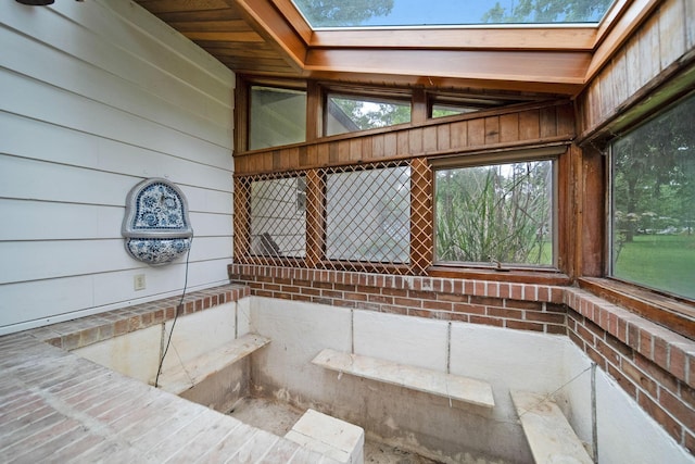 2692 Jordan Rd, Columbus, OH 43231 - bathroom with a skylight and wood walls