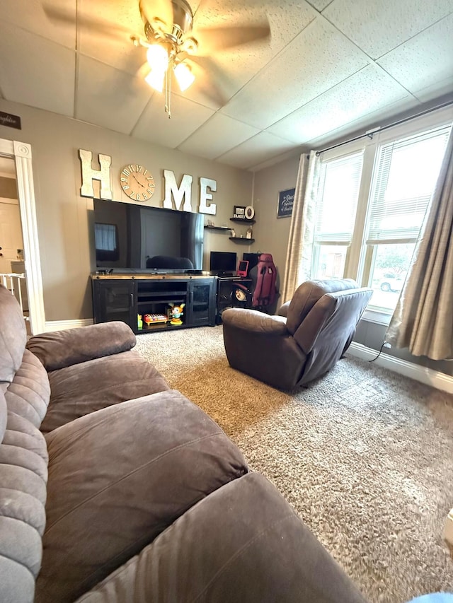 205 Walnut St, Circleville, OH 43113 - carpeted living room featuring ceiling fan and baseboards