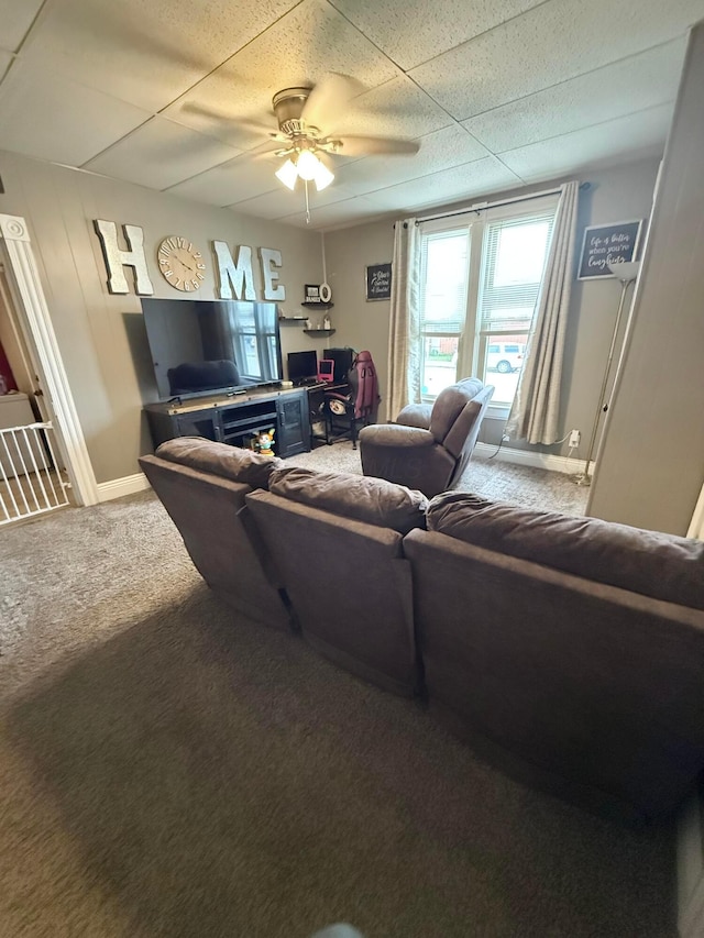 205 Walnut St, Circleville, OH 43113 - carpeted living area featuring ceiling fan, a drop ceiling, and baseboards
