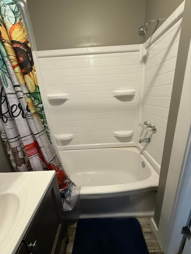 205 Walnut St, Circleville, OH 43113 - bathroom featuring shower / bath combination with curtain, vanity, and wood finished floors
