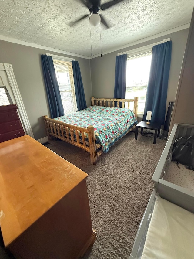 205 Walnut St, Circleville, OH 43113 - bedroom featuring carpet, ceiling fan, a textured ceiling, and crown molding