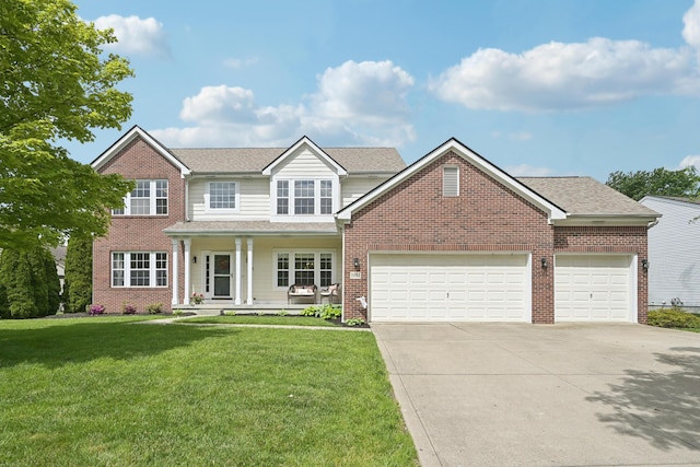 5952 Hampton Cors S, Hilliard, OH 43026 - view of front of home with a porch, brick siding, concrete driveway, and an attached garage