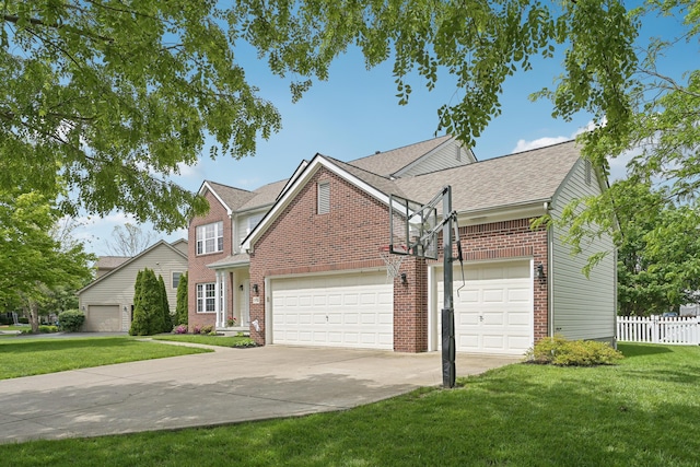 5952 Hampton Cors S, Hilliard, OH 43026 - traditional-style home featuring brick siding, a garage, driveway, and a shingled roof