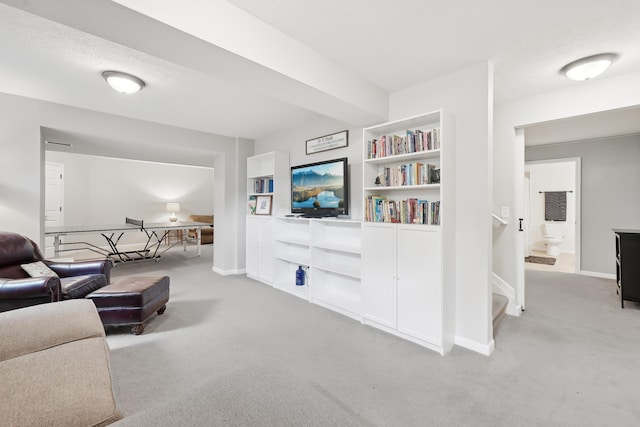 5952 Hampton Cors S, Hilliard, OH 43026 - living area featuring carpet flooring, baseboards, and built in shelves