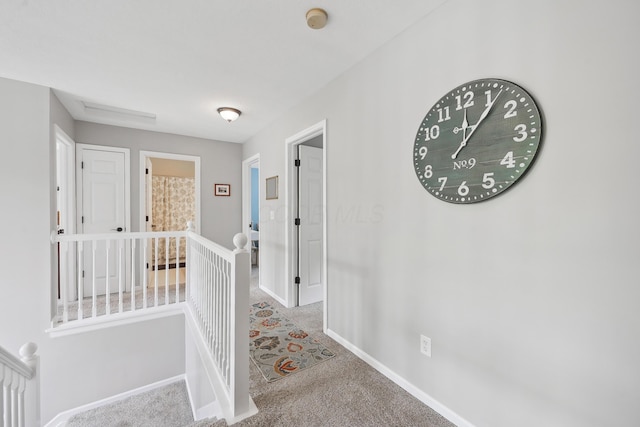 5952 Hampton Cors S, Hilliard, OH 43026 - corridor featuring baseboards, an upstairs landing, and carpet