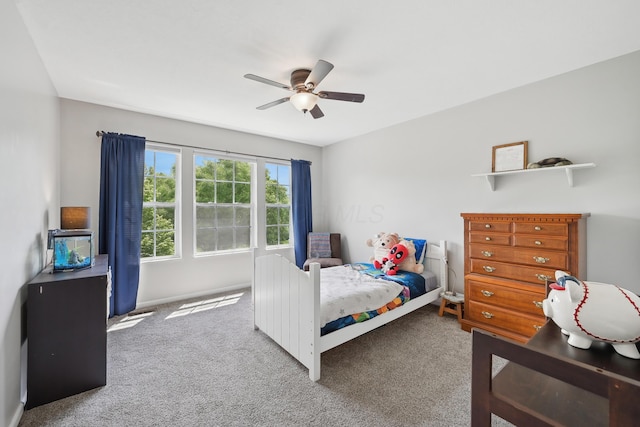 5952 Hampton Cors S, Hilliard, OH 43026 - carpeted bedroom with a ceiling fan and baseboards