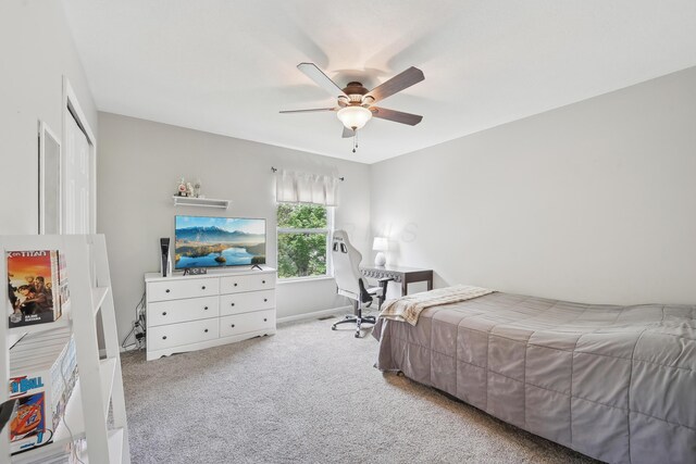 5952 Hampton Cors S, Hilliard, OH 43026 - bedroom with carpet flooring, a ceiling fan, and baseboards