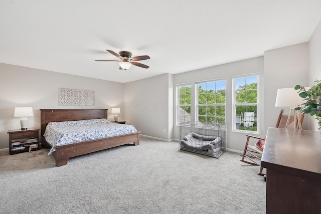 5952 Hampton Cors S, Hilliard, OH 43026 - carpeted bedroom with baseboards and a ceiling fan