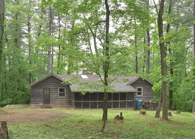 311 Chinook Ln, Sugar Grove, OH 43155 - back of property featuring a sunroom and a shingled roof
