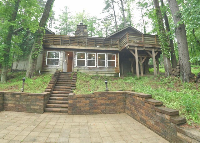 311 Chinook Ln, Sugar Grove, OH 43155 - log home featuring a chimney