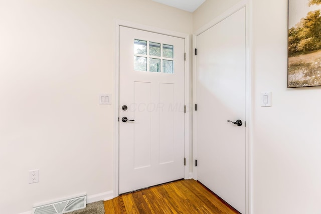 5786 Thompson Rd, Columbus, OH 43230 - doorway to outside featuring wood finished floors