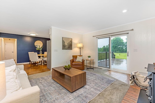 5786 Thompson Rd, Columbus, OH 43230 - living room featuring ornamental molding, wood finished floors, and baseboards