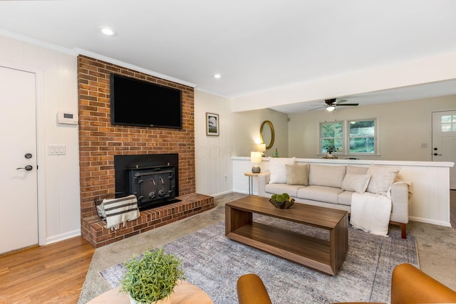 5786 Thompson Rd, Columbus, OH 43230 - living room featuring ornamental molding, a ceiling fan, a brick fireplace, recessed lighting, and baseboards