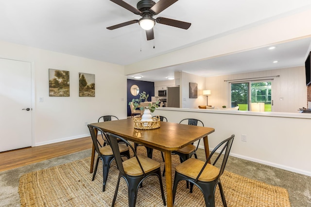 5786 Thompson Rd, Columbus, OH 43230 - dining area with ceiling fan, baseboards, wood finished floors, and recessed lighting