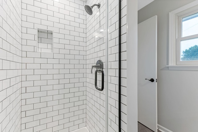 5786 Thompson Rd, Columbus, OH 43230 - bathroom featuring a stall shower and baseboards