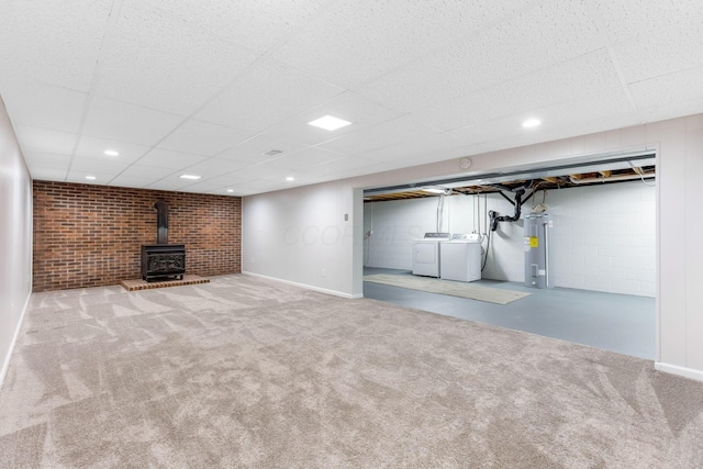 5786 Thompson Rd, Columbus, OH 43230 - finished basement with separate washer and dryer, a wood stove, carpet, water heater, and a paneled ceiling