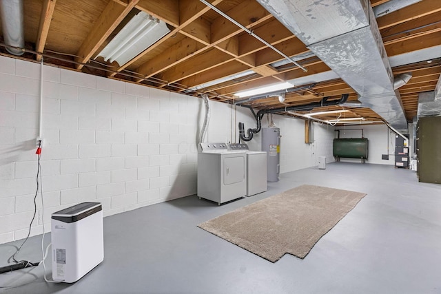 5786 Thompson Rd, Columbus, OH 43230 - unfinished basement with washer and dryer, heating fuel, electric water heater, concrete block wall, and heating unit
