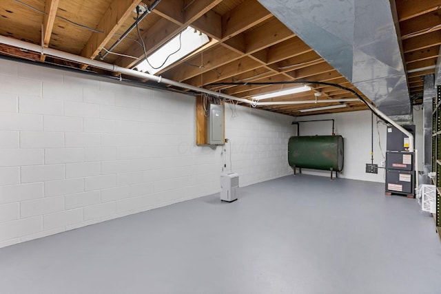 5786 Thompson Rd, Columbus, OH 43230 - unfinished basement featuring heating fuel, electric panel, and concrete block wall