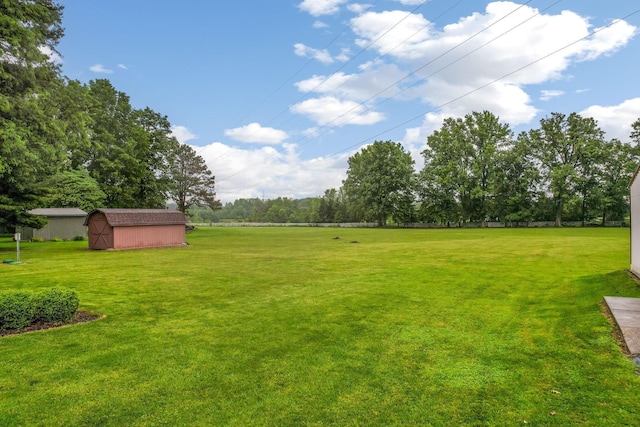 5786 Thompson Rd, Columbus, OH 43230 - view of grassy yard featuring view of wooded area