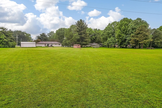 5786 Thompson Rd, Columbus, OH 43230 - view of green lawn with view of scattered trees