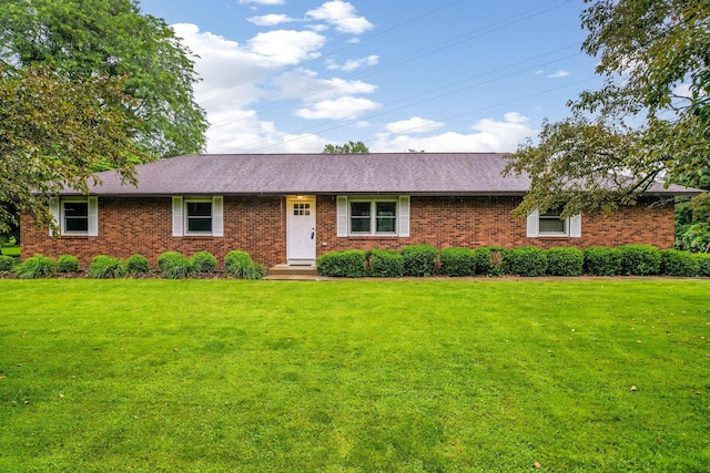 5786 Thompson Rd, Columbus, OH 43230 - ranch-style home featuring a front lawn, brick siding, and roof with shingles