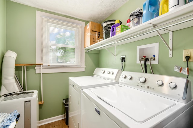 526 N Columbus St, Lancaster, OH 43130 - washroom with separate washer and dryer, wood finished floors, baseboards, and a textured ceiling