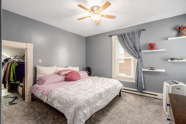 526 N Columbus St, Lancaster, OH 43130 - bedroom with a baseboard heating unit, carpet, ceiling fan, and baseboards