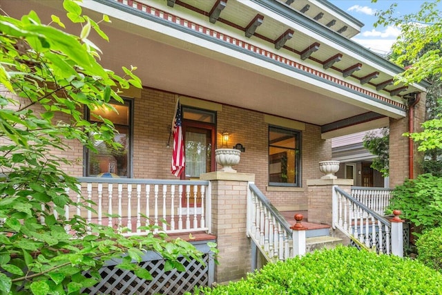 355 W 7th Ave, Columbus, OH 43201 - doorway to property with covered porch and brick siding