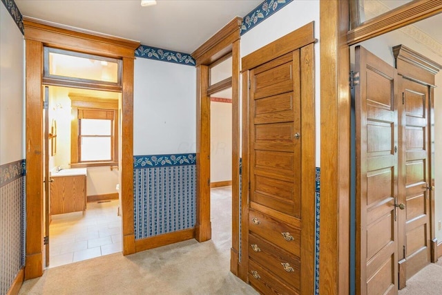 355 W 7th Ave, Columbus, OH 43201 - hallway featuring carpet, a wainscoted wall, baseboards, and wallpapered walls