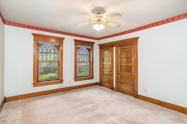 355 W 7th Ave, Columbus, OH 43201 - empty room featuring carpet floors, baseboards, and a ceiling fan