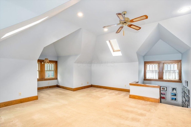 355 W 7th Ave, Columbus, OH 43201 - bonus room featuring carpet, a skylight, baseboards, lofted ceiling, and recessed lighting