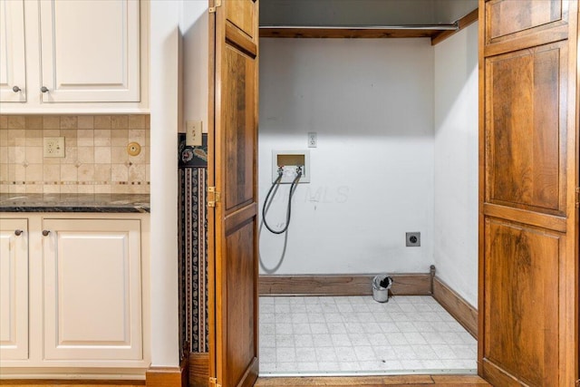 355 W 7th Ave, Columbus, OH 43201 - washroom featuring hookup for a washing machine, hookup for an electric dryer, cabinet space, and baseboards