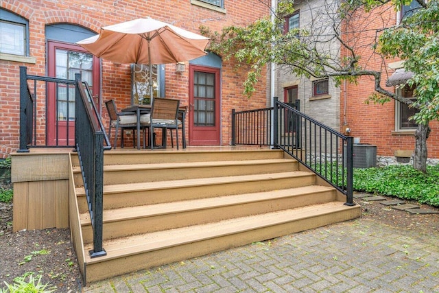 355 W 7th Ave, Columbus, OH 43201 - view of exterior entry featuring brick siding and central air condition unit