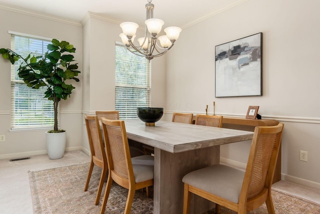 7019 Blakemore Ln, Dublin, OH 43016 - dining area featuring a chandelier, crown molding, healthy amount of natural light, and baseboards
