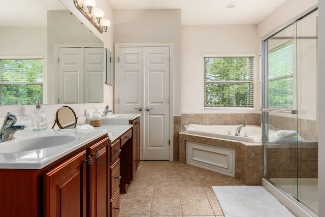 7019 Blakemore Ln, Dublin, OH 43016 - bathroom with double vanity, a bath, a stall shower, and tile patterned flooring
