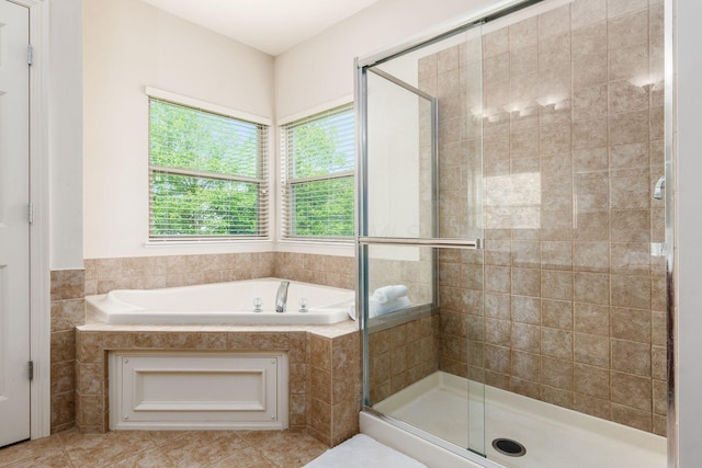 7019 Blakemore Ln, Dublin, OH 43016 - bathroom featuring a bath and a shower stall