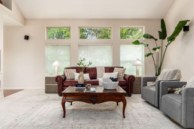 7019 Blakemore Ln, Dublin, OH 43016 - carpeted living room featuring healthy amount of natural light and baseboards
