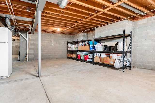 7019 Blakemore Ln, Dublin, OH 43016 - unfinished basement featuring freestanding refrigerator and concrete block wall