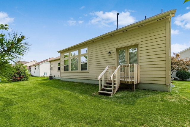 7019 Blakemore Ln, Dublin, OH 43016 - rear view of house featuring a yard