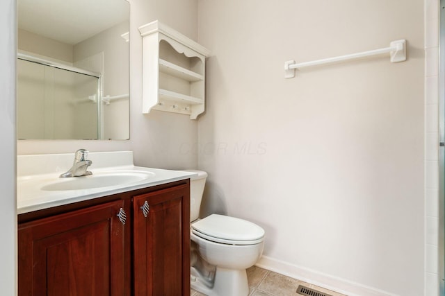 7019 Blakemore Ln, Dublin, OH 43016 - full bathroom featuring vanity, toilet, an enclosed shower, and tile patterned floors