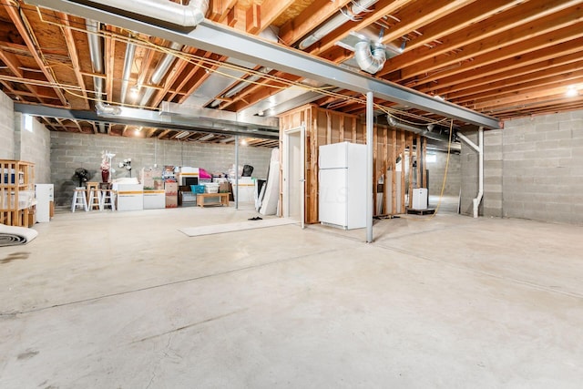 7019 Blakemore Ln, Dublin, OH 43016 - unfinished basement with freestanding refrigerator and concrete block wall
