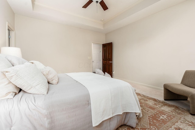 7019 Blakemore Ln, Dublin, OH 43016 - carpeted bedroom featuring a raised ceiling, crown molding, a ceiling fan, and baseboards