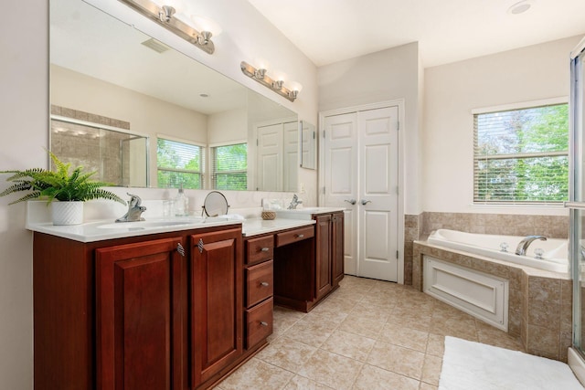 7019 Blakemore Ln, Dublin, OH 43016 - full bath with a garden tub, double vanity, a shower stall, and tile patterned flooring