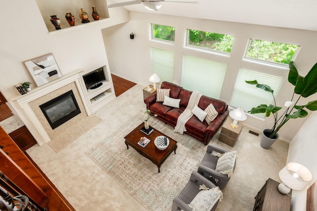 7019 Blakemore Ln, Dublin, OH 43016 - living room featuring a ceiling fan and a high end fireplace