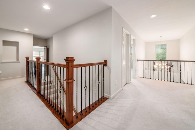 7019 Blakemore Ln, Dublin, OH 43016 - hall featuring carpet, an upstairs landing, recessed lighting, and baseboards